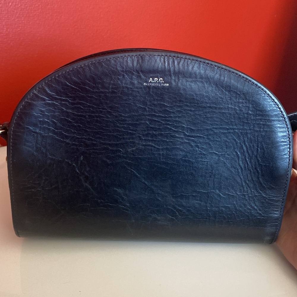 A.P.C. PARIS Black Demi-Lune bag in embossed calfskin leather used.